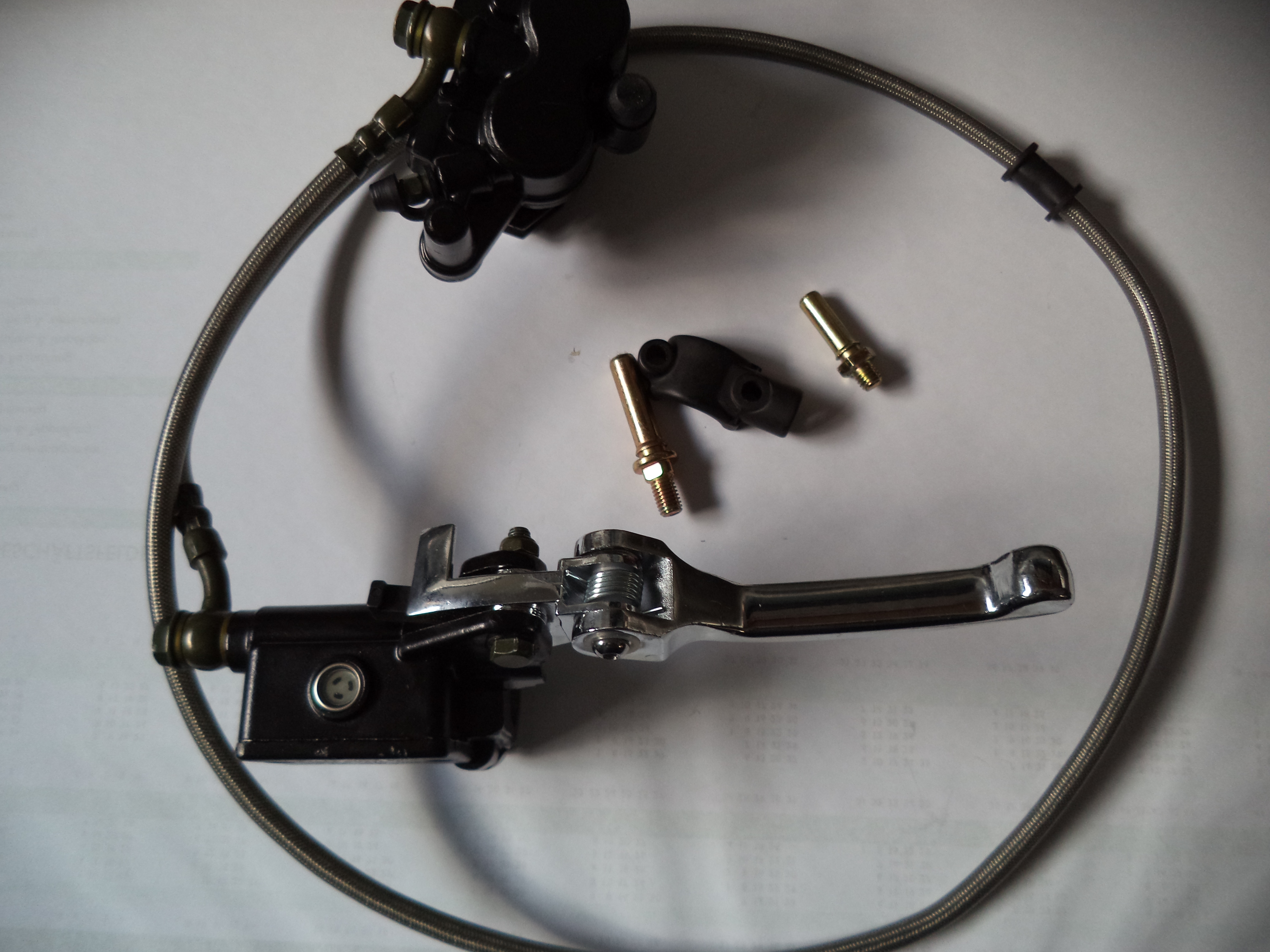 Bemssattel mit Stahlfexleitung und Bremspumpe mit Klapphebel RACING